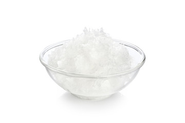Bowl with coconut oil isolated on white background.