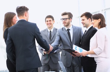 welcome and handshake of business partners on the briefing