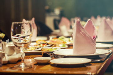 Blurred for background.Dining table with tablecloth in the restaurant