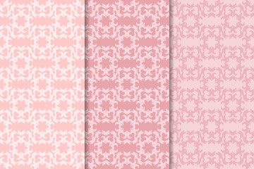 Set of floral ornaments. Pale pink vertical seamless patterns