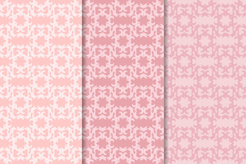 Set of floral ornaments. Pale pink vertical seamless patterns