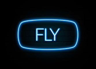 Fly  - colorful Neon Sign on brickwall
