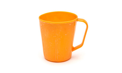 Vintage plastic mug isolated on white background