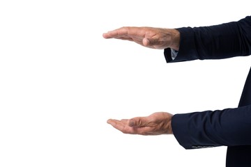 Obraz premium Businessman pretending to hold something