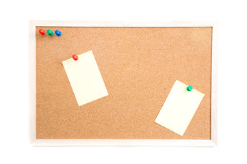 Cork board with post it and push pins and wooden frame on white background with clipping path