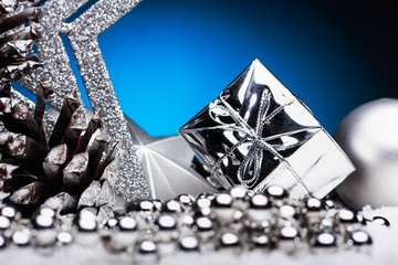 Christmas composition of Christmas tree toys on a blue background