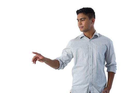 Man pretending to touch an invisible screen