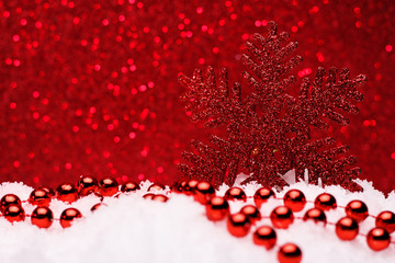 Christmas composition of Christmas tree toys on a red background