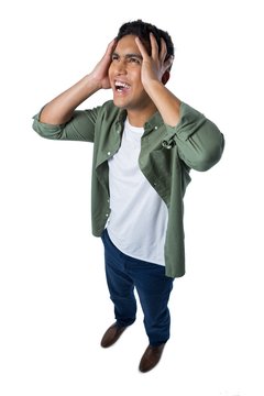 Man With Hands On Head Standing On White Background