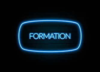 Formation  - colorful Neon Sign on brickwall