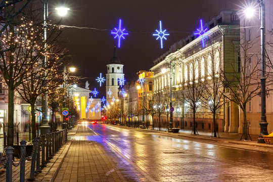 Decorated and illuminated Christmas Gediminas prospect and Cathedral Belfry at night, Vilnius, Lithuania, Baltic states.