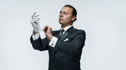 At Your service, well dressed man waiting for orders isolated on white background with copy space