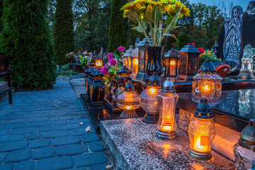 Colorful candles on the cemetery at All Saints Day