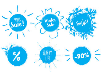 Obraz premium Winter sale banner with stains and snowflakes. Season clearence discount stamp