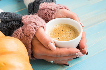hands holding cup coffee