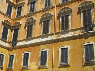 Facade of a classical building in the historical center of Rome, Italy