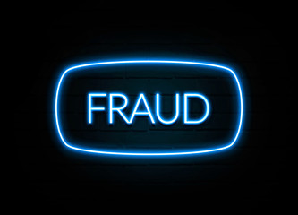 Fraud  - colorful Neon Sign on brickwall