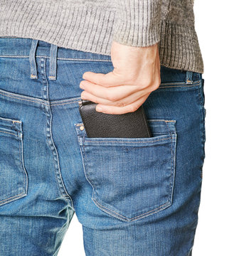 A Man Pulls Out A Black Leather Purse From His Back Pocket Of Jeans