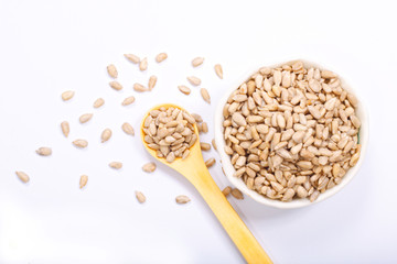 Healthy food concept top view sunflower seeds on white background 