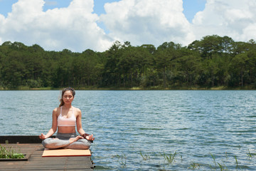 Fototapeta na wymiar Enjoying yoga practice