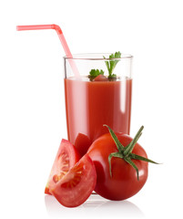 Tomato juice in a glass with herbs
