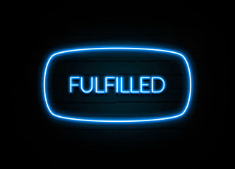 Fulfilled  - colorful Neon Sign on brickwall