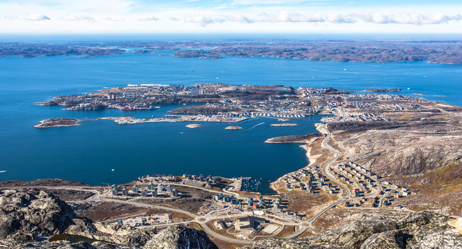Aerial panoramic full view of Nuuk city and fjord from the top of Store Malena mountain, Greenland