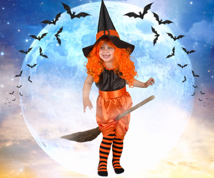 Little girl witch flying on a broom across the sky.