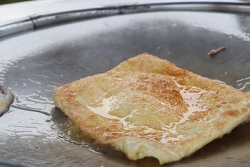 Making of dessert sweet roti