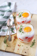 Two verrines breakfast. Eggs, tomatoes and bell pepper