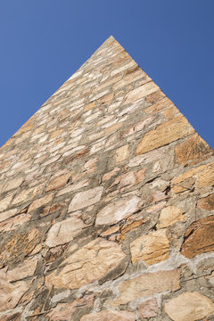 Stone pyramid with blue sky
