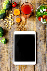 concept diet and tablet with vegetables mock up