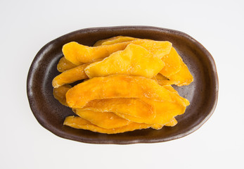 Dried Mango or Dried Mango slices on a background.