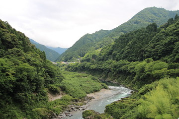 Fototapeta na wymiar 渓流と風景 日本 アジア