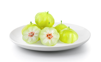 star gooseberry in a plate isolated on a white background