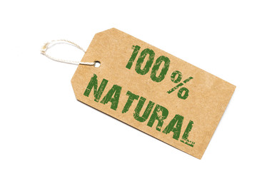one hundred percent natural sign - a paper price tag on a white background - shopping concept