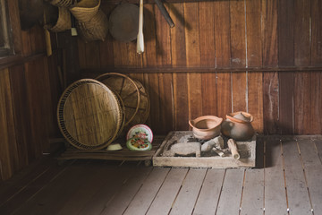 pot, wicker basket in traditional kitchen in rural Thailand. old Thai kitchenware