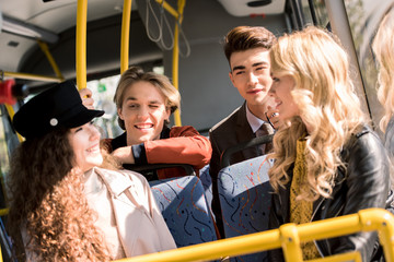 friends talking in bus