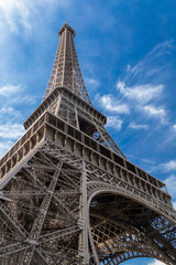 Fototapeta na wymiar Eiffel Tower in Paris, France on a blue sky