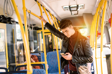 Fototapeta na wymiar man using smartphone in bus