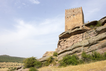 Fototapeta na wymiar The Castillo de Zafra, a 12th-century castle built on a sandstone outcrop in Sierra de Caldereros, Campillo de Duenas, Castilla La Mancha, Spain