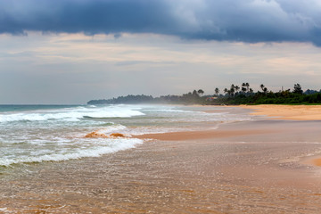 Moonsoon on a beach of a tropical island