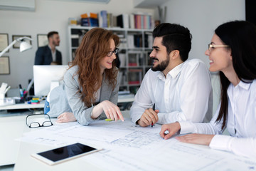 Group of architects working together on project