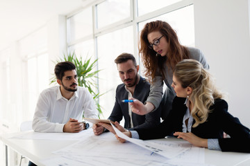 Fototapeta premium Group of architects working together on project