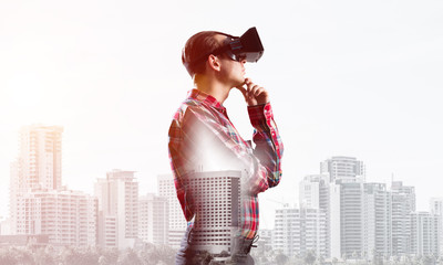Guy wearing checked shirt and virtual mask with hand on chin