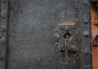 Grunge background - rusty antique door knocker
