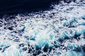 Fototapeta premium Waves and bubbles background, sea texture