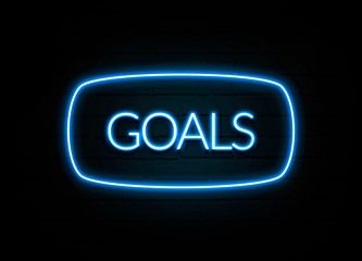 Goals  - colorful Neon Sign on brickwall