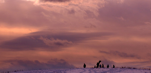 Amesbury: Sledders enjoy the snow at Woodsom Farm under a changing winter sky Monday afternoon. Jim Vaiknoras/staff photo