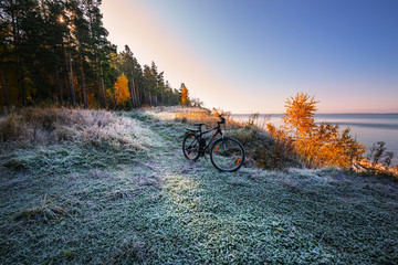 Obraz premium Autumn landscape with mountain Biking near the river. The Ob River, Siberia